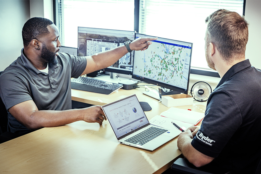 oil & gas supply chain technology shown on computer screens