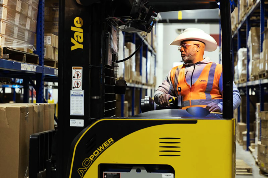 Ryder worker on a forklift